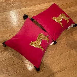 Two pink cheetah chinoiserie throw pillows